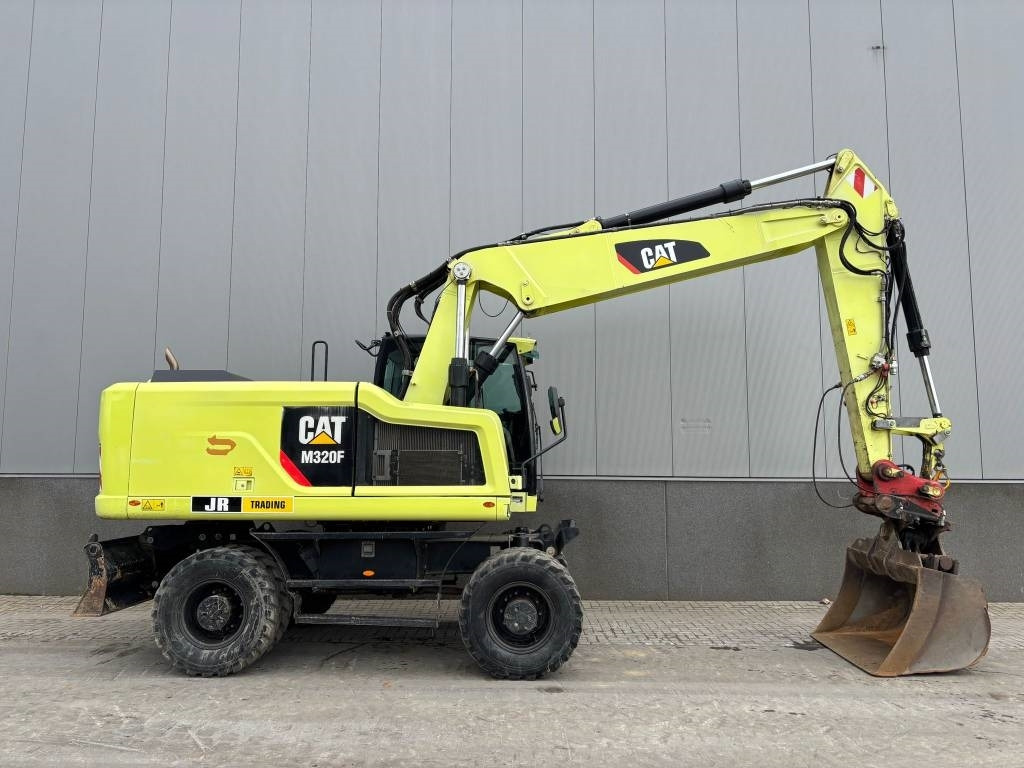 Gumikerekes kotró CAT M 320 F: 6 kép. Gumikerekes kotró CAT M 320 F: 6 kép.