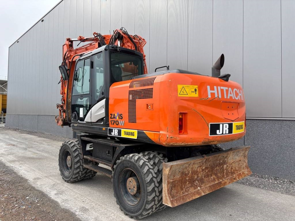 Hitachi ZX 170 W-5 B (low hours/new tires) - Gumikerekes kotró: 3 kép. Hitachi ZX 170 W-5 B (low hours/new tires) - Gumikerekes kotró: 3 kép.