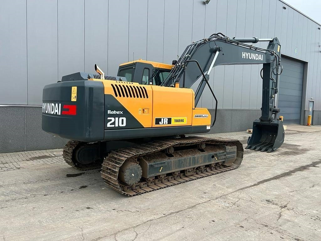 Hyundai R 210 - Lánctalpas kotró: 5 kép. Hyundai R 210 - Lánctalpas kotró: 5 kép.