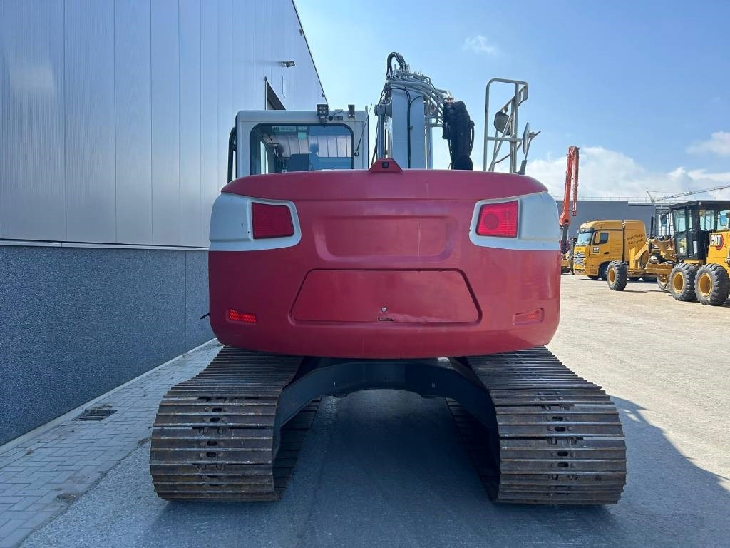 Takeuchi TB 2150 R - Lánctalpas kotró: 4 kép. Takeuchi TB 2150 R - Lánctalpas kotró: 4 kép.