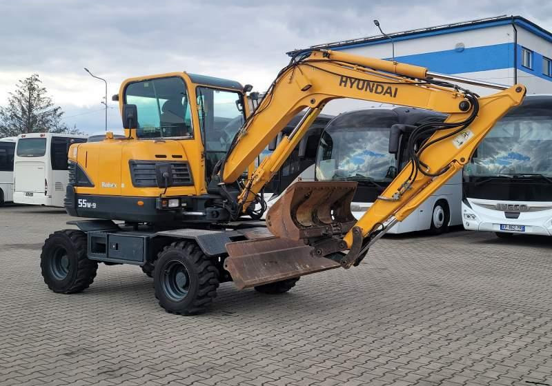 Hyundai ROBEX 55W-9 EXCAVATOR / SPROWADZONY Z FRANCJI - Gumikerekes kotró: 1 kép. Hyundai ROBEX 55W-9 EXCAVATOR / SPROWADZONY Z FRANCJI - Gumikerekes kotró: 1 kép.