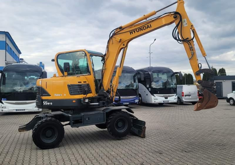 Hyundai ROBEX 55W-9 EXCAVATOR / SPROWADZONY Z FRANCJI - Gumikerekes kotró: 4 kép. Hyundai ROBEX 55W-9 EXCAVATOR / SPROWADZONY Z FRANCJI - Gumikerekes kotró: 4 kép.