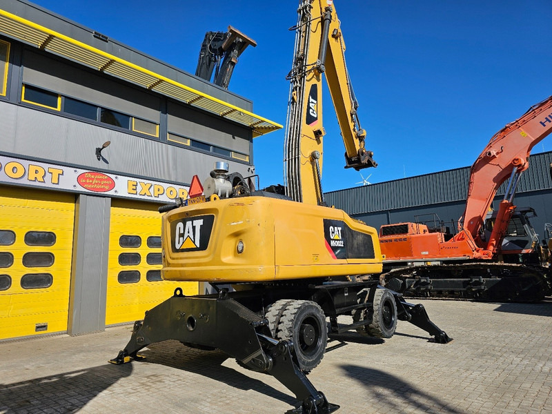 Caterpillar MH 3022 - Gumikerekes kotró: 5 kép. Caterpillar MH 3022 - Gumikerekes kotró: 5 kép.