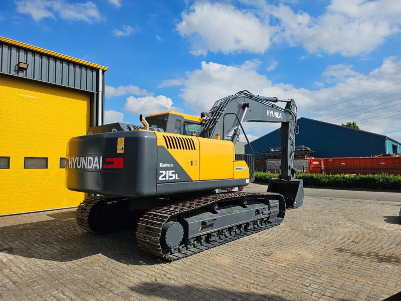 Hyundai R215L - Lánctalpas kotró: 4 kép. Hyundai R215L - Lánctalpas kotró: 4 kép.