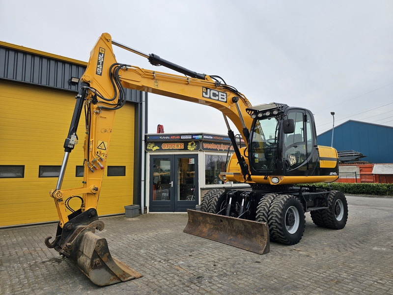JCB JS145W - Gumikerekes kotró: 2 kép. JCB JS145W - Gumikerekes kotró: 2 kép.