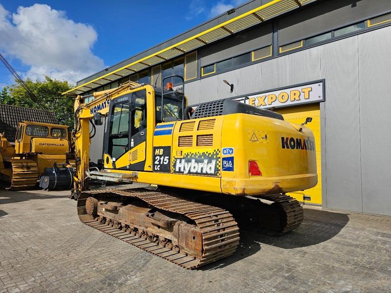 Komatsu HB215LC-2 - Lánctalpas kotró: 3 kép. Komatsu HB215LC-2 - Lánctalpas kotró: 3 kép.