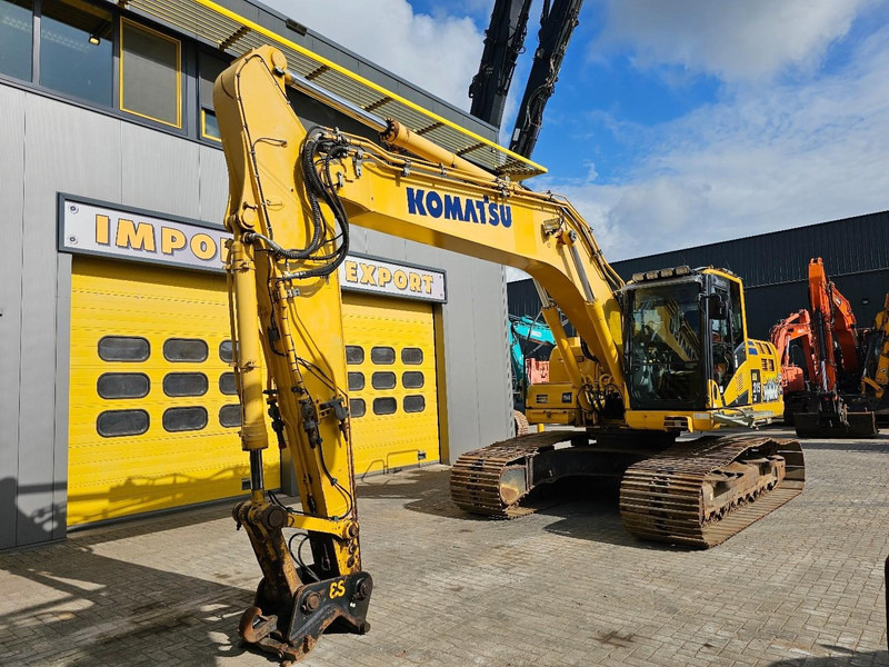 Komatsu HB215LC-2 - Lánctalpas kotró: 2 kép. Komatsu HB215LC-2 - Lánctalpas kotró: 2 kép.