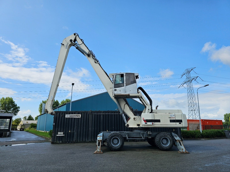 Terex TM350 - Hulladék kotró: 1 kép. Terex TM350 - Hulladék kotró: 1 kép.