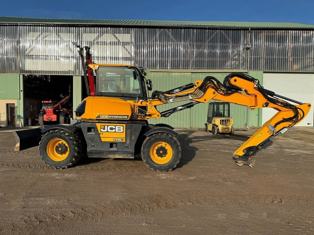 JCB HD 110 WT Hydradig 4F - Gumikerekes kotró: 2 kép. JCB HD 110 WT Hydradig 4F - Gumikerekes kotró: 2 kép.
