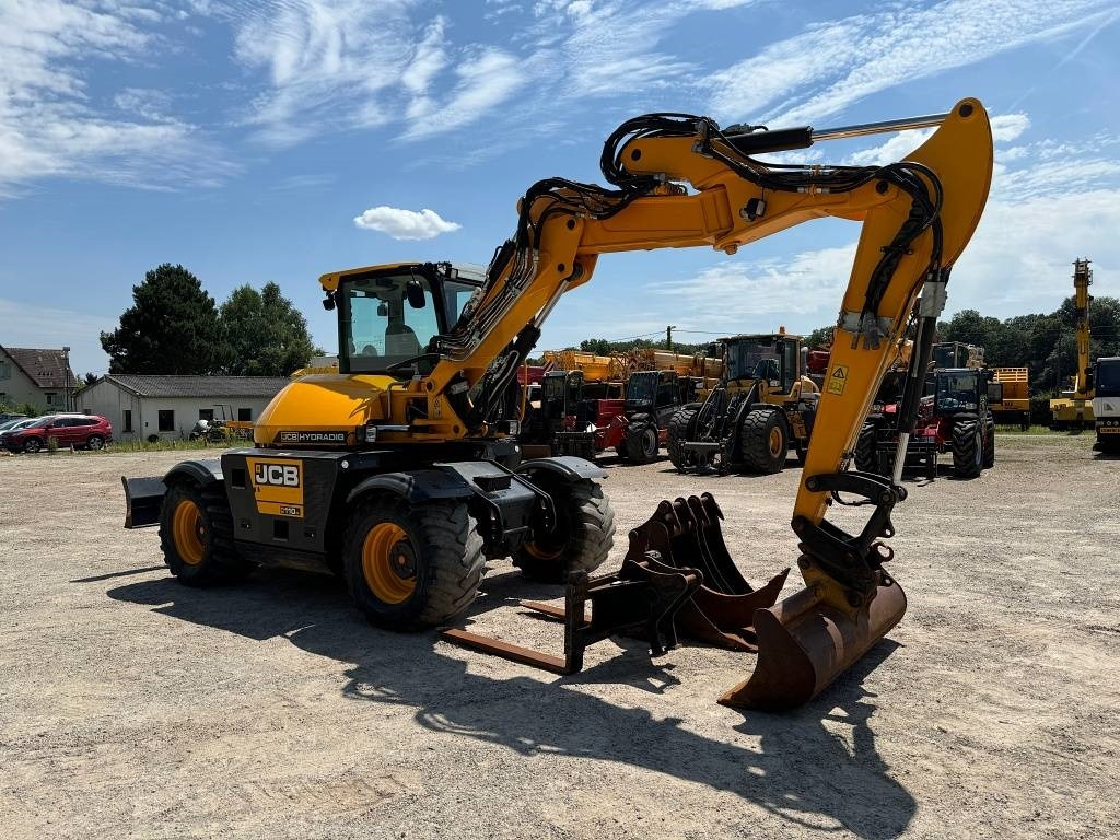 JCB HD 110 WT Hydradig - Gumikerekes kotró: 2 kép. JCB HD 110 WT Hydradig - Gumikerekes kotró: 2 kép.