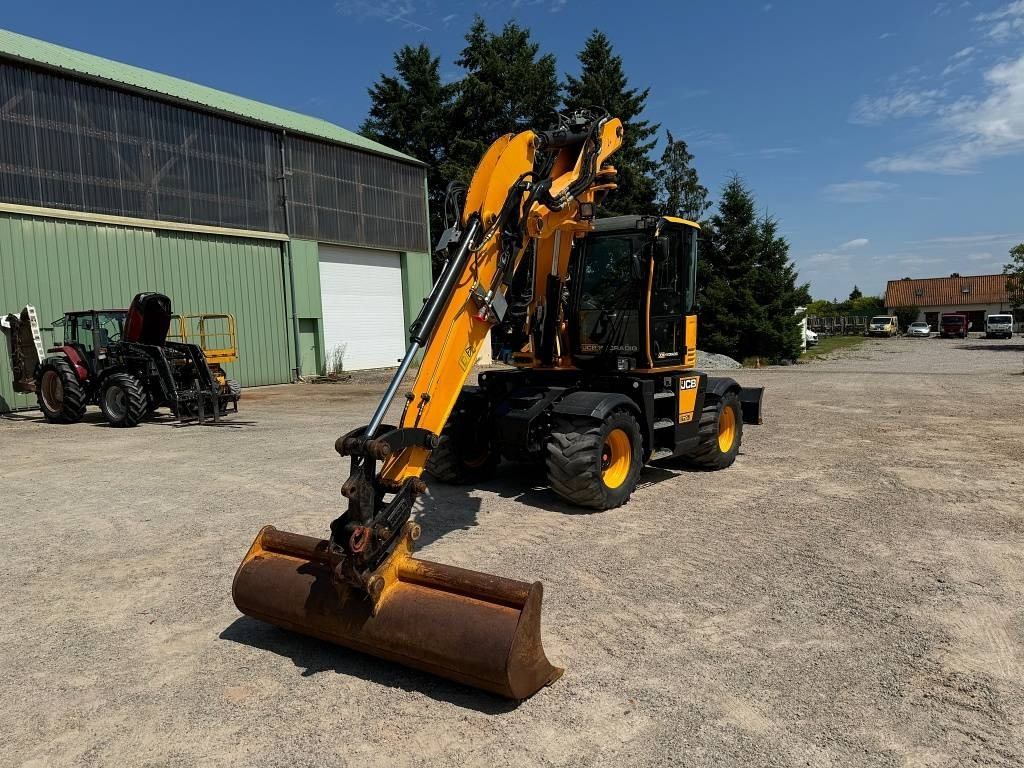 JCB HD 110 WT Hydradig - Gumikerekes kotró: 5 kép. JCB HD 110 WT Hydradig - Gumikerekes kotró: 5 kép.