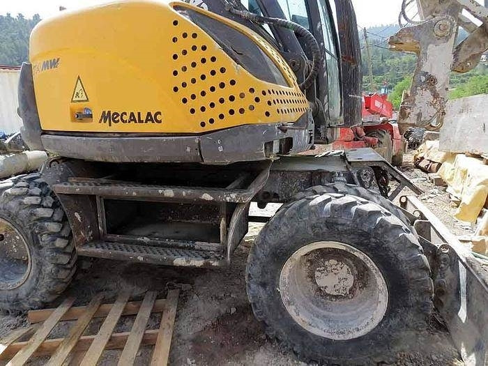 Mecalac 714 MW - Kotrógép: 2 kép. Mecalac 714 MW - Kotrógép: 2 kép.
