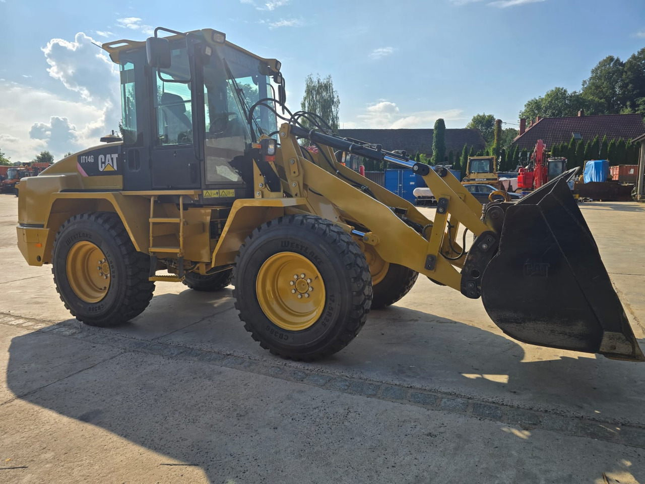 CATERPILLAR IT 14G - Gumikerekes homlokrakodó: 5 kép. CATERPILLAR IT 14G - Gumikerekes homlokrakodó: 5 kép.