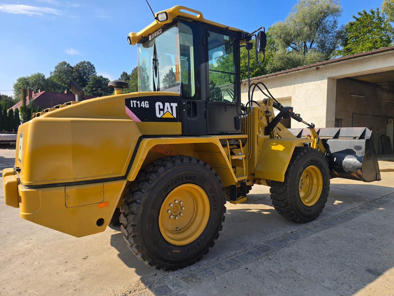 CATERPILLAR IT 14G - Gumikerekes homlokrakodó: 4 kép. CATERPILLAR IT 14G - Gumikerekes homlokrakodó: 4 kép.