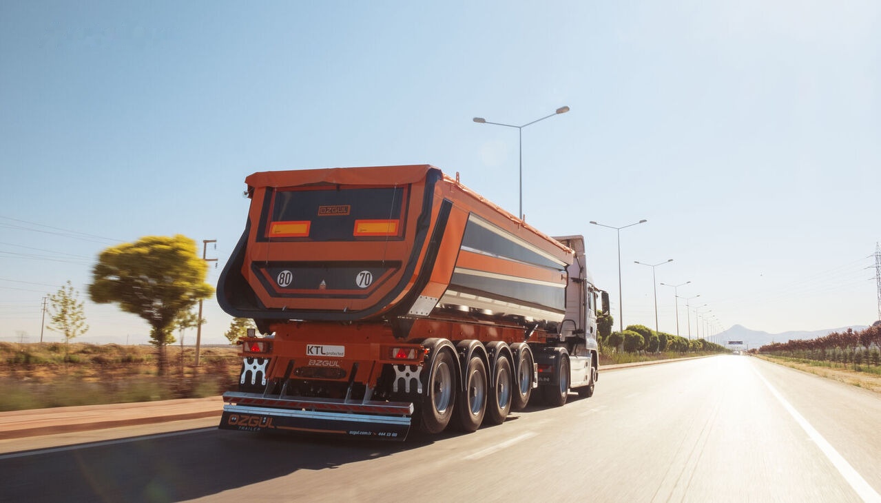 Özgül 4 AXLE TIPPING SEMI TRAILER - Félpótkocsi billenőplatós: 1 kép. Özgül 4 AXLE TIPPING SEMI TRAILER - Félpótkocsi billenőplatós: 1 kép.
