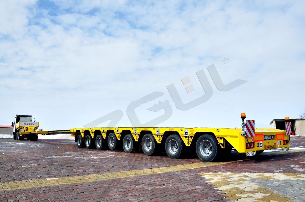 Özgül 8 AXLE LOWBED SEMI TRAILER - Pótkocsi mélybölcsős: 2 kép. Özgül 8 AXLE LOWBED SEMI TRAILER - Pótkocsi mélybölcsős: 2 kép.