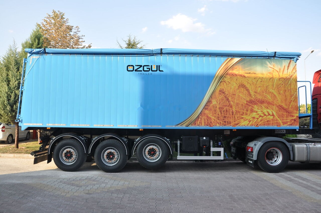 Özgül TIPPING TRAILER FOR GRAIN - Félpótkocsi billenőplatós: 1 kép. Özgül TIPPING TRAILER FOR GRAIN - Félpótkocsi billenőplatós: 1 kép.