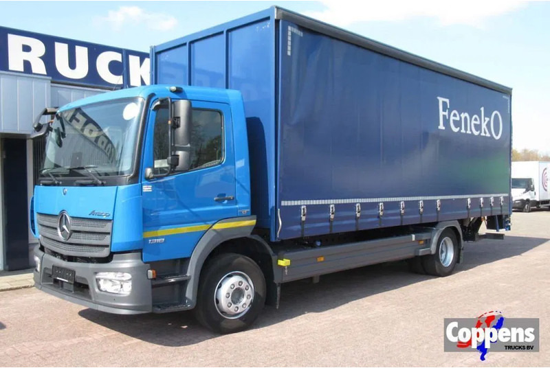 Mercedes-Benz Atego 1318L Euro 6 - Ponyvás teherautó: 1 kép. Mercedes-Benz Atego 1318L Euro 6 - Ponyvás teherautó: 1 kép.