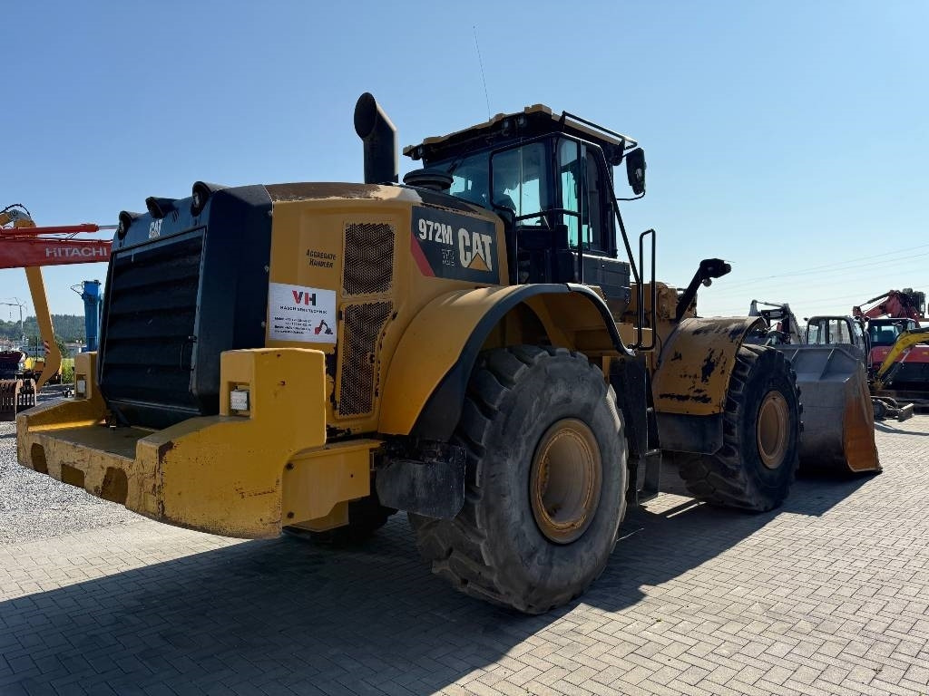 CAT 972 M - Gumikerekes homlokrakodó: 5 kép. CAT 972 M - Gumikerekes homlokrakodó: 5 kép.