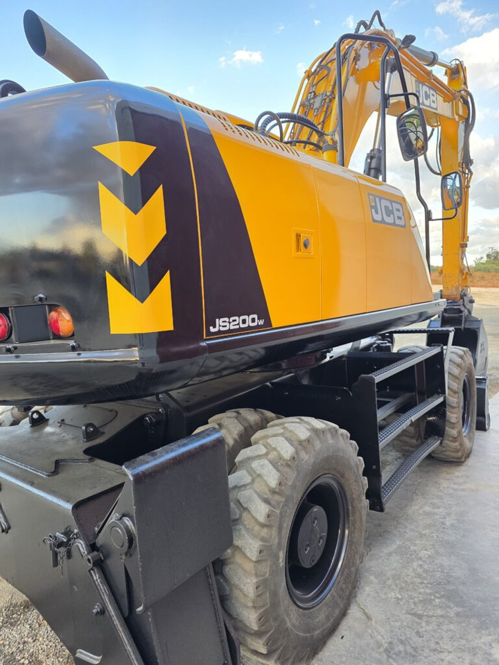 JCB JS200WT4 - Gumikerekes kotró: 4 kép. JCB JS200WT4 - Gumikerekes kotró: 4 kép.