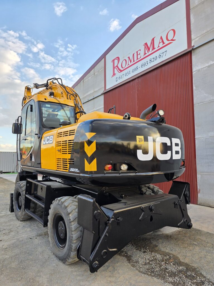JCB JS200WT4 - Gumikerekes kotró: 2 kép. JCB JS200WT4 - Gumikerekes kotró: 2 kép.