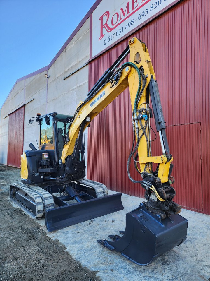 YANMAR VIO57 - Minikotró: 4 kép. YANMAR VIO57 - Minikotró: 4 kép.