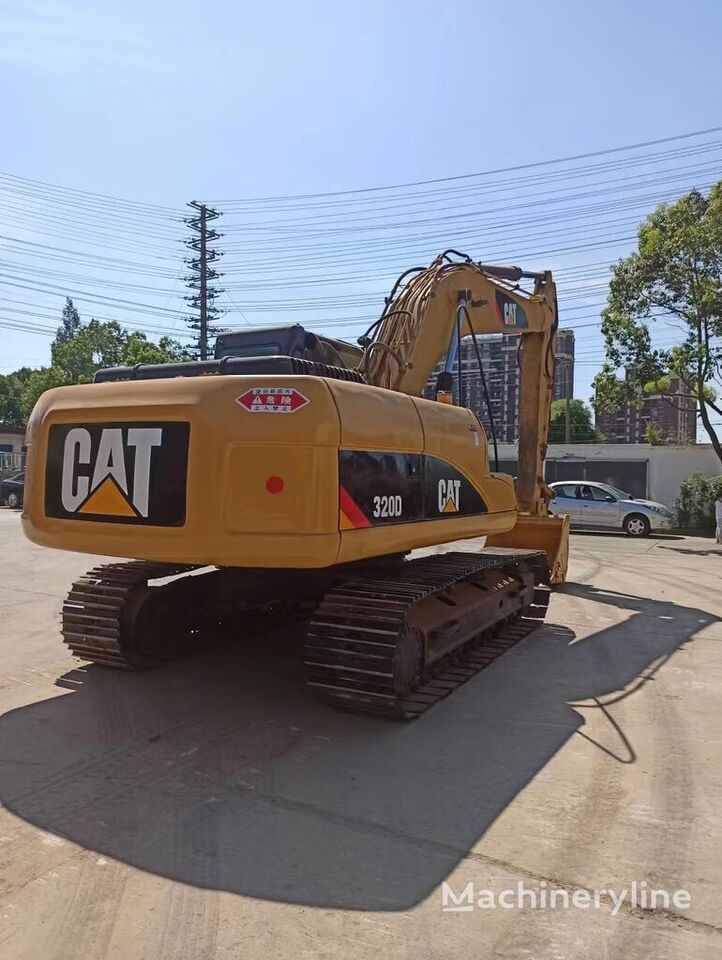 Caterpillar 320D - Lánctalpas kotró: 1 kép. Caterpillar 320D - Lánctalpas kotró: 1 kép.