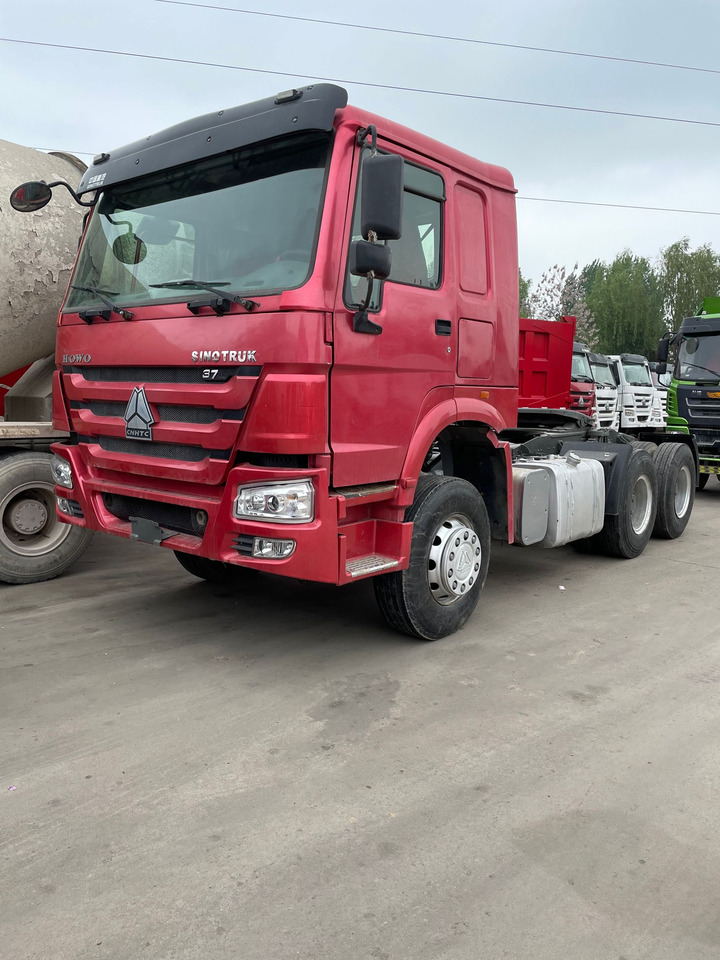 HOWO SINOTRUCK TRACTOR 6X4 371HP - Nyergesvontató: 1 kép. HOWO SINOTRUCK TRACTOR 6X4 371HP - Nyergesvontató: 1 kép.