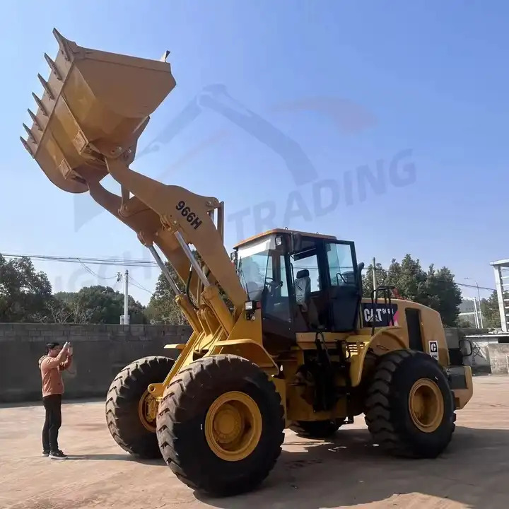 95%new Good Performance Used Cat966h Loader Second Hand Caterpillar Cat966c cat966d cat966g With Good Condition in stock - Gumikerekes homlokrakodó: 1 kép. 95%new Good Performance Used Cat966h Loader Second Hand Caterpillar Cat966c cat966d cat966g With Good Condition in stock - Gumikerekes homlokrakodó: 1 kép.