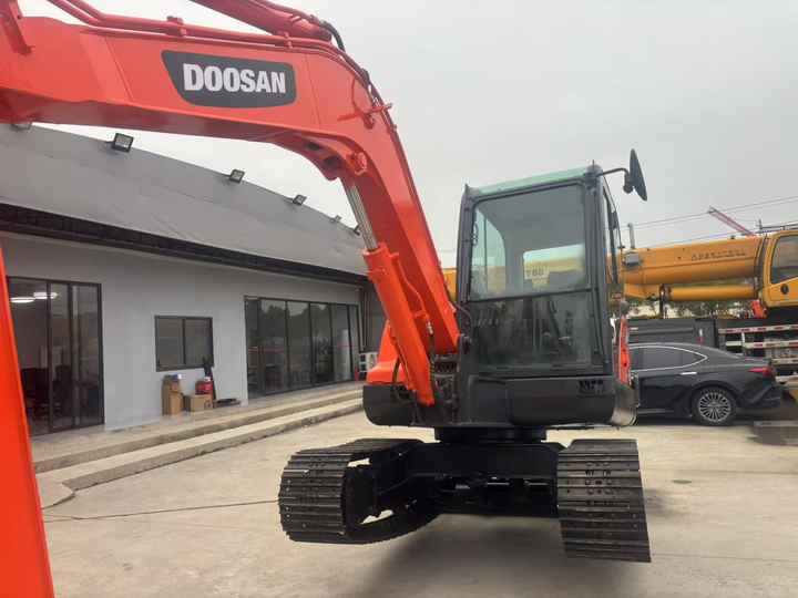 Doosan DX60 DX60-9c DH60-7 DX60W DX80 DX75 DX55 DH35 DH55 Used Mini Excavator Mas Maquinaria Municipal Y Ambiental - Kotrógép: 3 kép. Doosan DX60 DX60-9c DH60-7 DX60W DX80 DX75 DX55 DH35 DH55 Used Mini Excavator Mas Maquinaria Municipal Y Ambiental - Kotrógép: 3 kép.