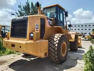 Used Construction Caterpillar 966h Wheeled Loader Cat966h Cat966 Wheel Loader in Shanghai - Gumikerekes homlokrakodó: 2 kép. Used Construction Caterpillar 966h Wheeled Loader Cat966h Cat966 Wheel Loader in Shanghai - Gumikerekes homlokrakodó: 2 kép.