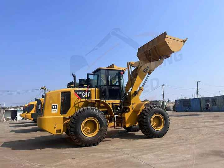 Used Japanese Cat966H Used Wheel Loaders Cheap Price Wheel Loader 966H second-hand construction machinery - Gumikerekes homlokrakodó: 3 kép. Used Japanese Cat966H Used Wheel Loaders Cheap Price Wheel Loader 966H second-hand construction machinery - Gumikerekes homlokrakodó: 3 kép.