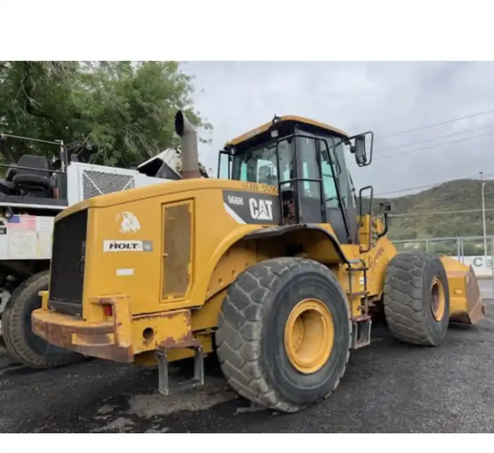 Used Wheel Loader Cat 950H 950 957 966 Crane Front Loader Cater Pillar Price Loaders - Gumikerekes homlokrakodó: 3 kép. Used Wheel Loader Cat 950H 950 957 966 Crane Front Loader Cater Pillar Price Loaders - Gumikerekes homlokrakodó: 3 kép.