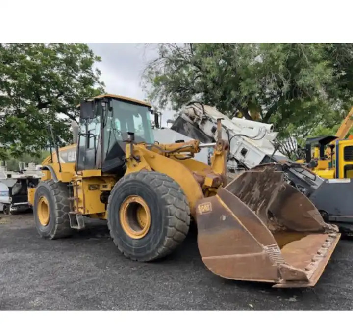 Used Wheel Loader Cat 950H 950 957 966 Crane Front Loader Cater Pillar Price Loaders - Gumikerekes homlokrakodó: 1 kép. Used Wheel Loader Cat 950H 950 957 966 Crane Front Loader Cater Pillar Price Loaders - Gumikerekes homlokrakodó: 1 kép.