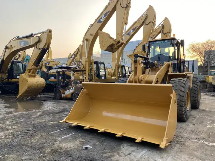 Second hand construction machinery used cat wheel loader used CAT 966H second hand wheel loader - Gumikerekes homlokrakodó: 2 kép. Second hand construction machinery used cat wheel loader used CAT 966H second hand wheel loader - Gumikerekes homlokrakodó: 2 kép.