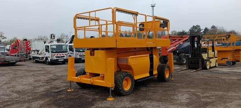 JLG 4394RT - 15m, 4x4, diesel - Ollós emelő: 2 kép. JLG 4394RT - 15m, 4x4, diesel - Ollós emelő: 2 kép.