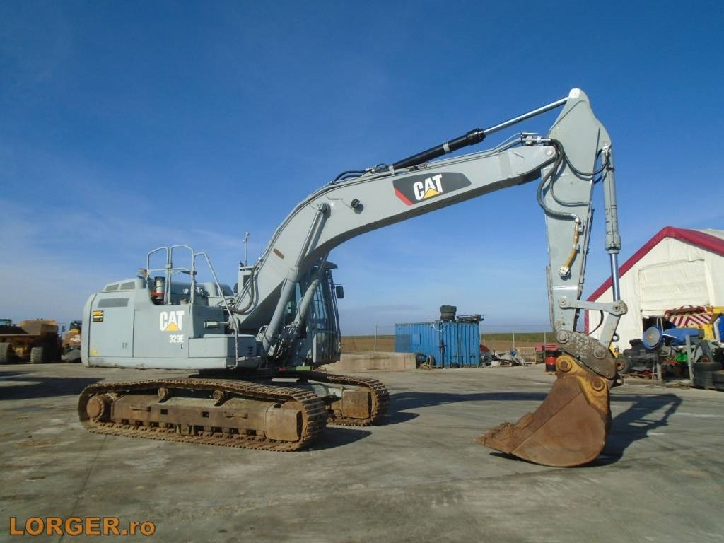 CAT 329 EL - Lánctalpas kotró: 4 kép. CAT 329 EL - Lánctalpas kotró: 4 kép.