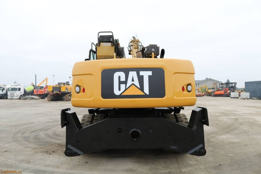 CAT M 322 D - Hulladék kotró: 5 kép. CAT M 322 D - Hulladék kotró: 5 kép.