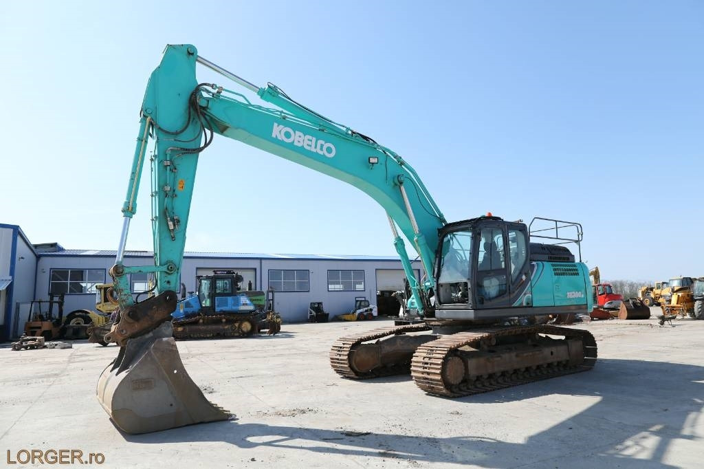 Kobelco SK 300 LC - 10 - Lánctalpas kotró: 1 kép. Kobelco SK 300 LC - 10 - Lánctalpas kotró: 1 kép.