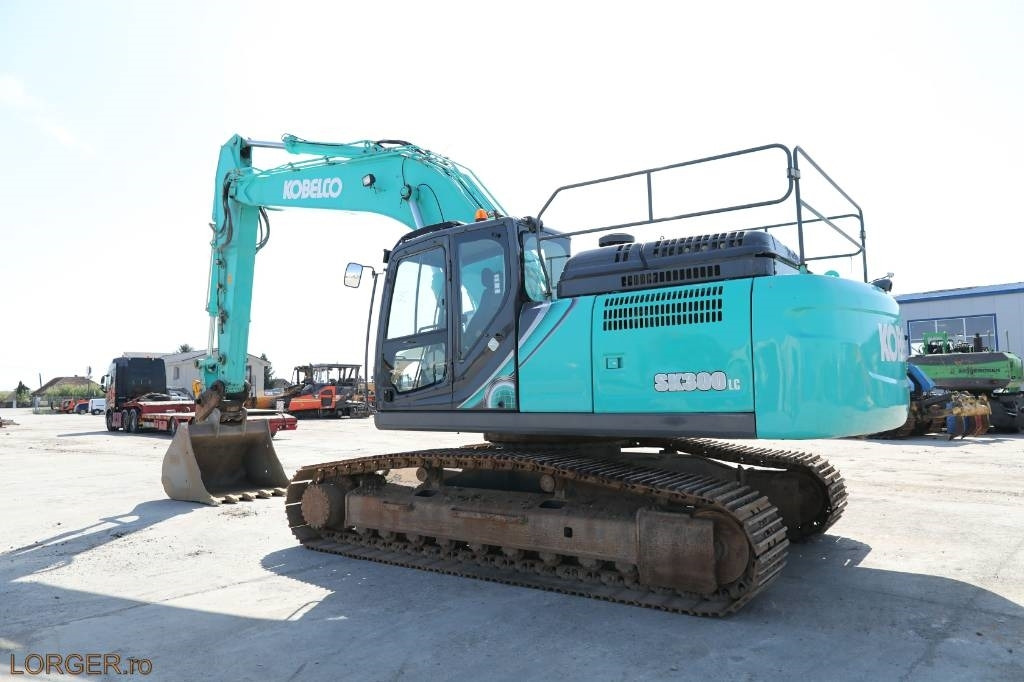 Kobelco SK 300 LC - 10 - Lánctalpas kotró: 2 kép. Kobelco SK 300 LC - 10 - Lánctalpas kotró: 2 kép.
