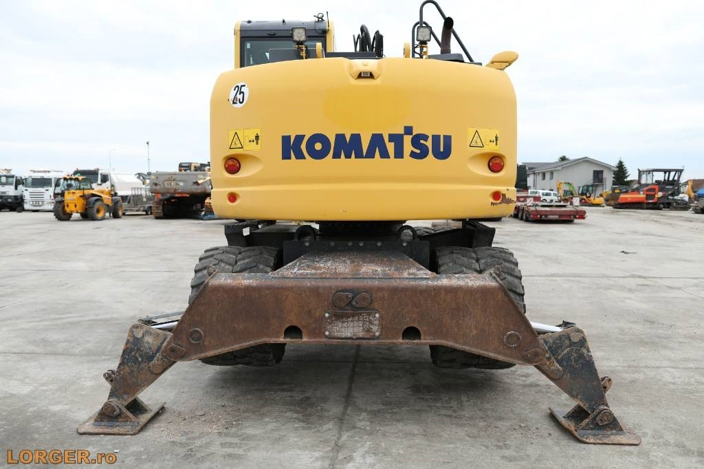 Komatsu PW 148-10 - Gumikerekes kotró: 5 kép. Komatsu PW 148-10 - Gumikerekes kotró: 5 kép.