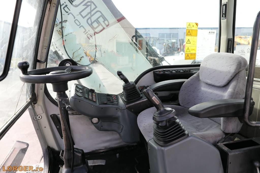 Gumikerekes kotró Liebherr A 316 Litronic: 12 kép. Gumikerekes kotró Liebherr A 316 Litronic: 12 kép.