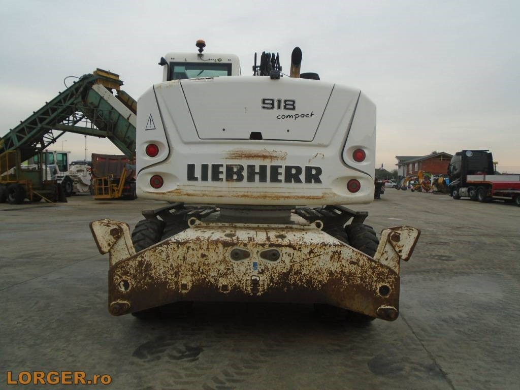 Liebherr A 918 Compact - Gumikerekes kotró: 5 kép. Liebherr A 918 Compact - Gumikerekes kotró: 5 kép.