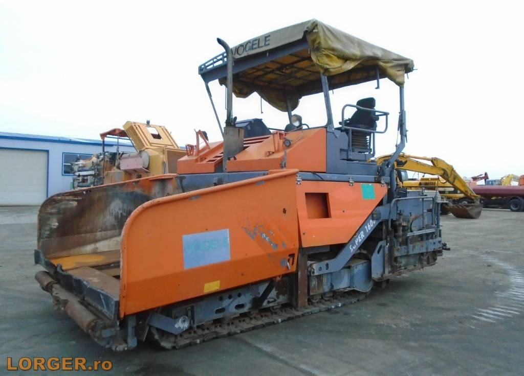 Vögele Super 1600 - Útburkológép: 1 kép. Vögele Super 1600 - Útburkológép: 1 kép.