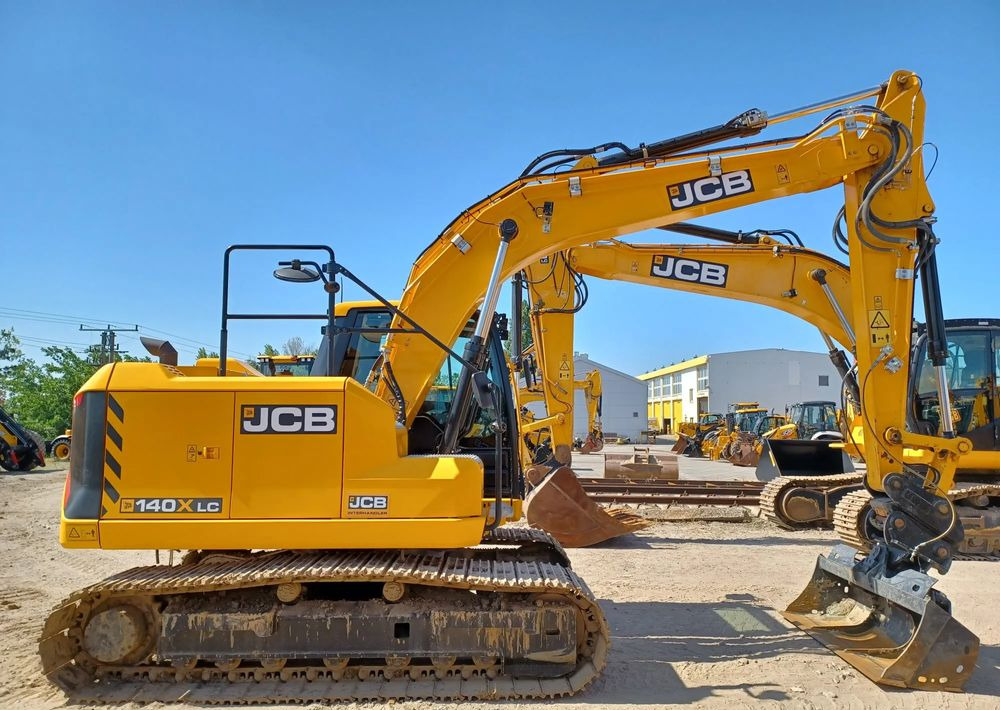 JCB 140X - Lánctalpas kotró: 4 kép. JCB 140X - Lánctalpas kotró: 4 kép.
