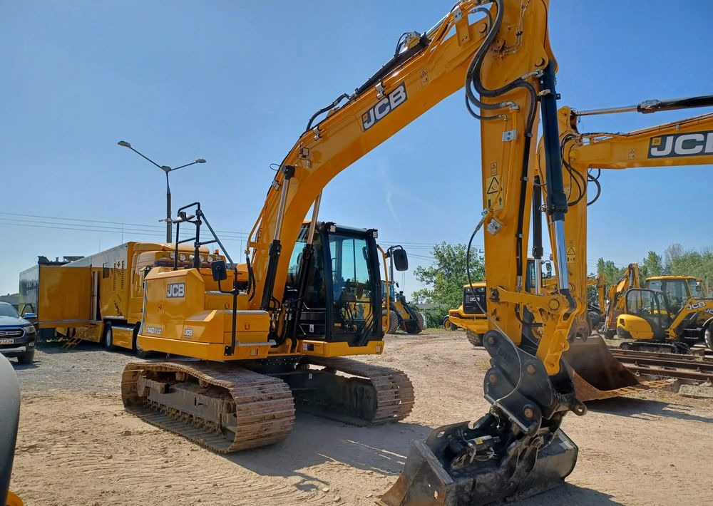 JCB 140X - Lánctalpas kotró: 2 kép. JCB 140X - Lánctalpas kotró: 2 kép.