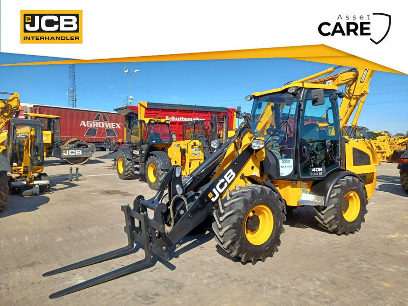 JCB 406 - Gumikerekes homlokrakodó: 1 kép. JCB 406 - Gumikerekes homlokrakodó: 1 kép.