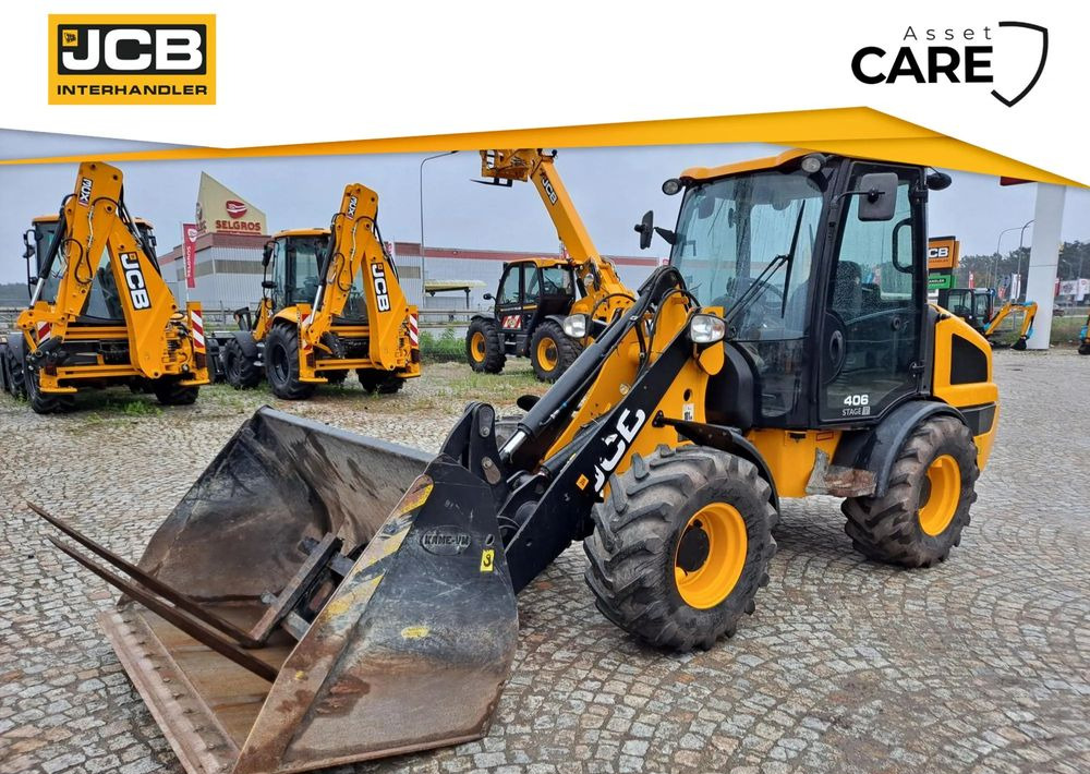 JCB 406 - Gumikerekes homlokrakodó: 1 kép. JCB 406 - Gumikerekes homlokrakodó: 1 kép.