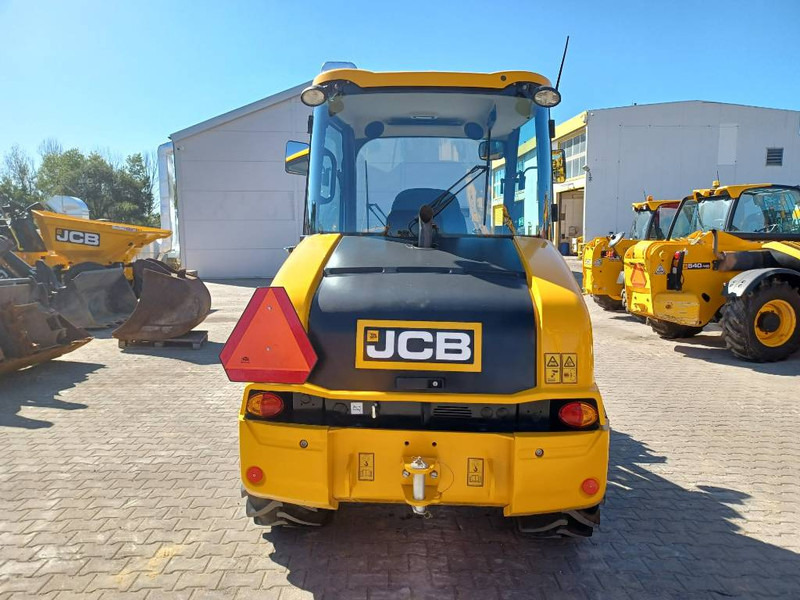 JCB 406 - Gumikerekes homlokrakodó: 5 kép. JCB 406 - Gumikerekes homlokrakodó: 5 kép.