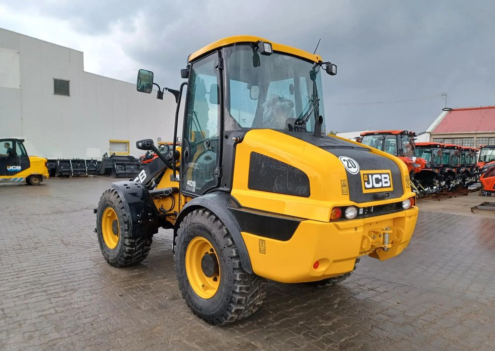 JCB 409 - Gumikerekes homlokrakodó: 5 kép. JCB 409 - Gumikerekes homlokrakodó: 5 kép.
